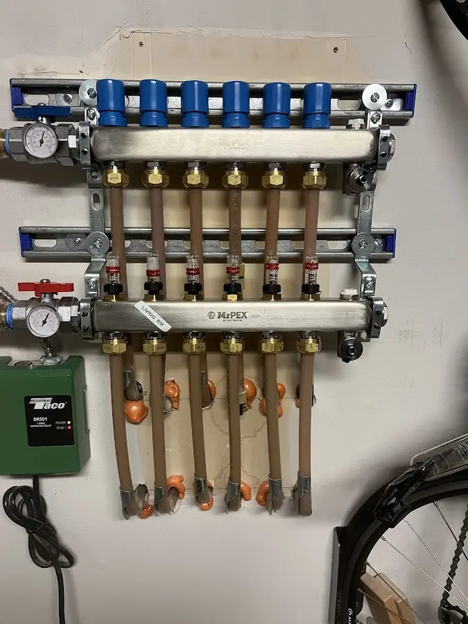 Plumber performing Gas Line Installation at a residential property in Stafford